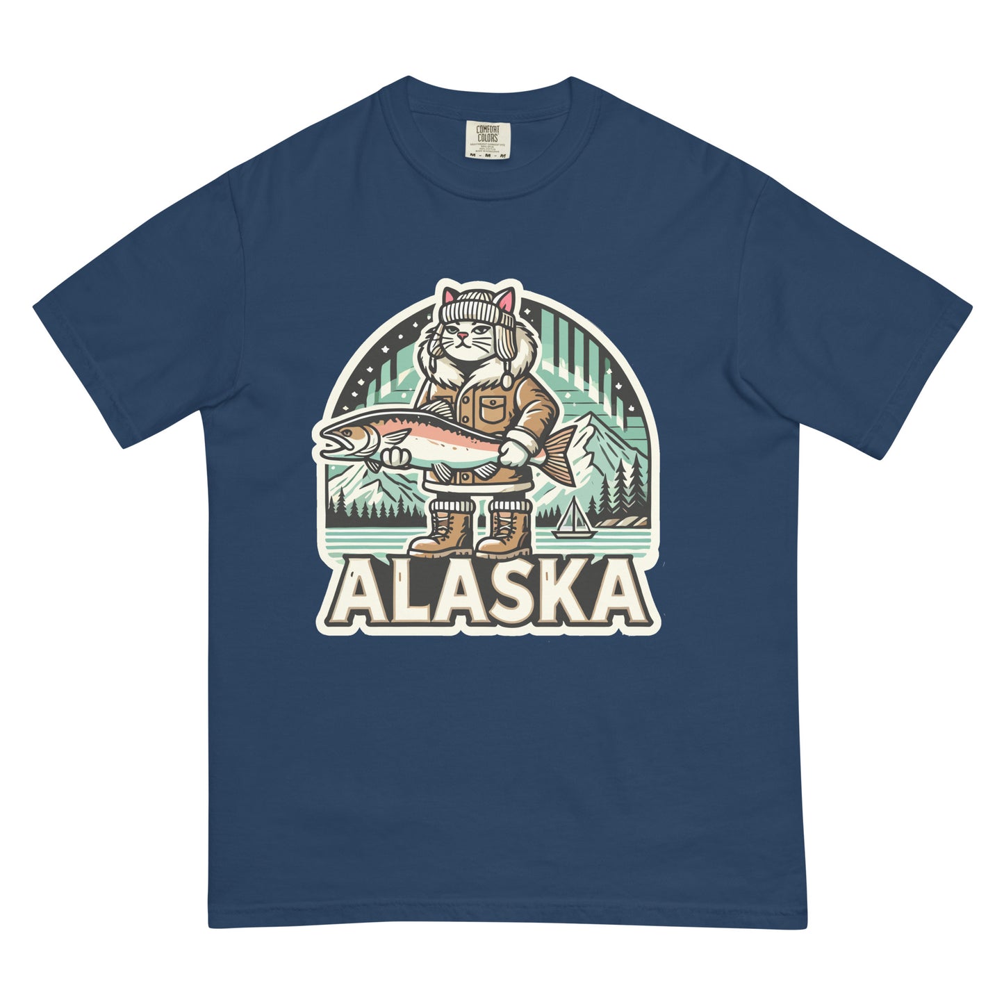 Blue Alaska cat T-shirt featuring a cat dressed in winter gear holding a large fish with mountain background