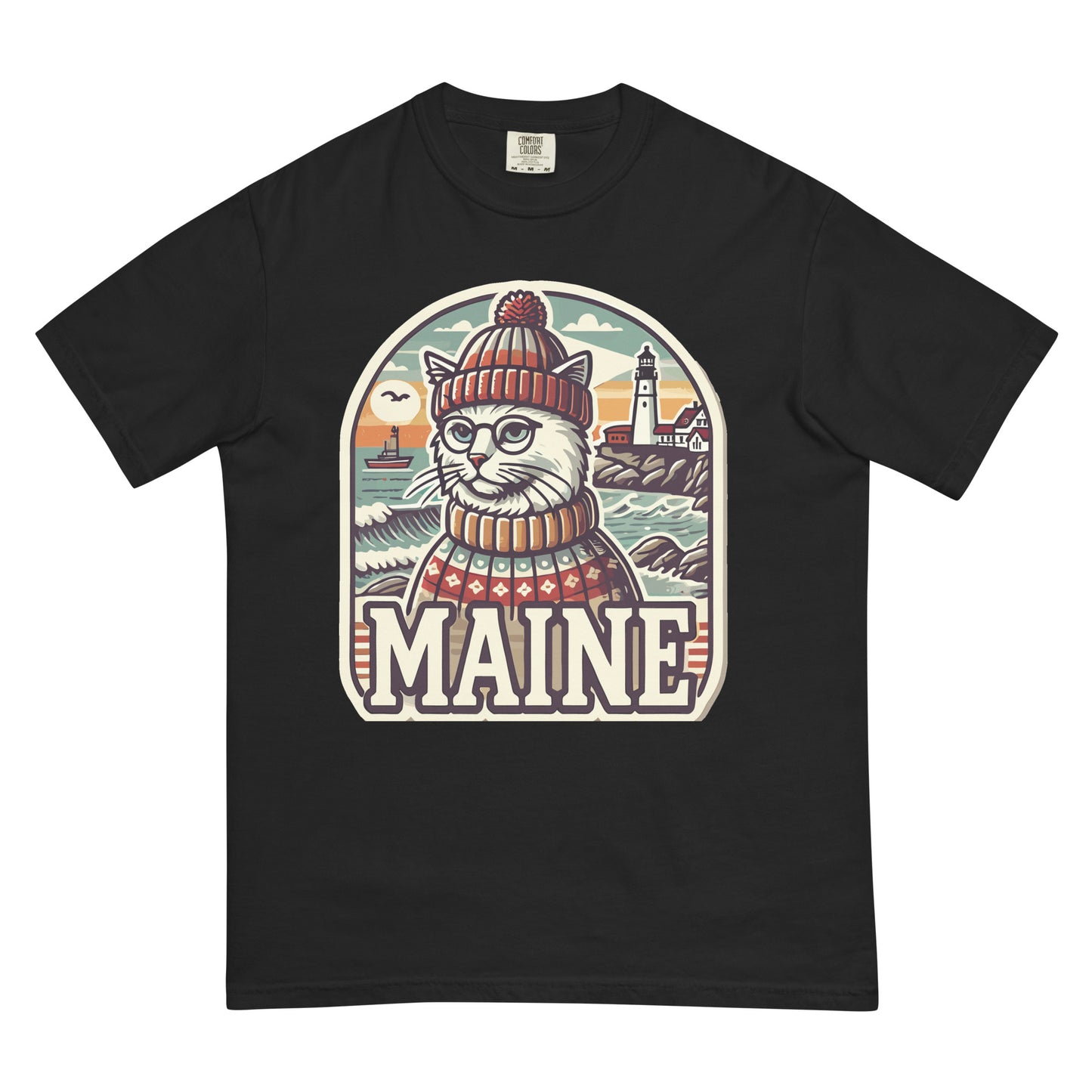 Black Maine cat t-shirt with graphic of cat wearing a hat and sweater near lighthouse and ocean