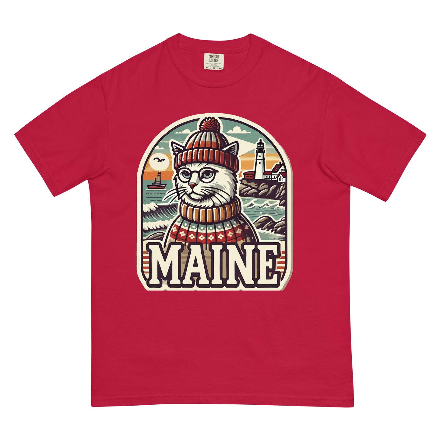 Red Maine cat t-shirt featuring a cat in a sweater and hat with a lighthouse background