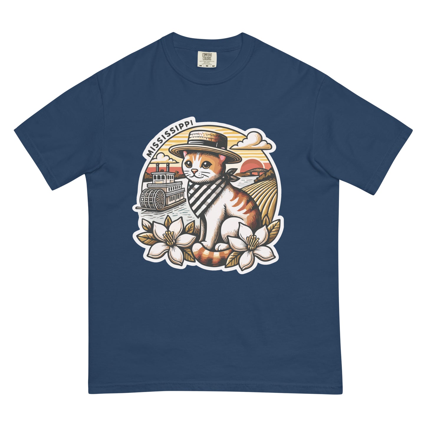 Blue Mississippi cat t-shirt featuring a cat with a hat and scarf by a riverboat and magnolia flowers