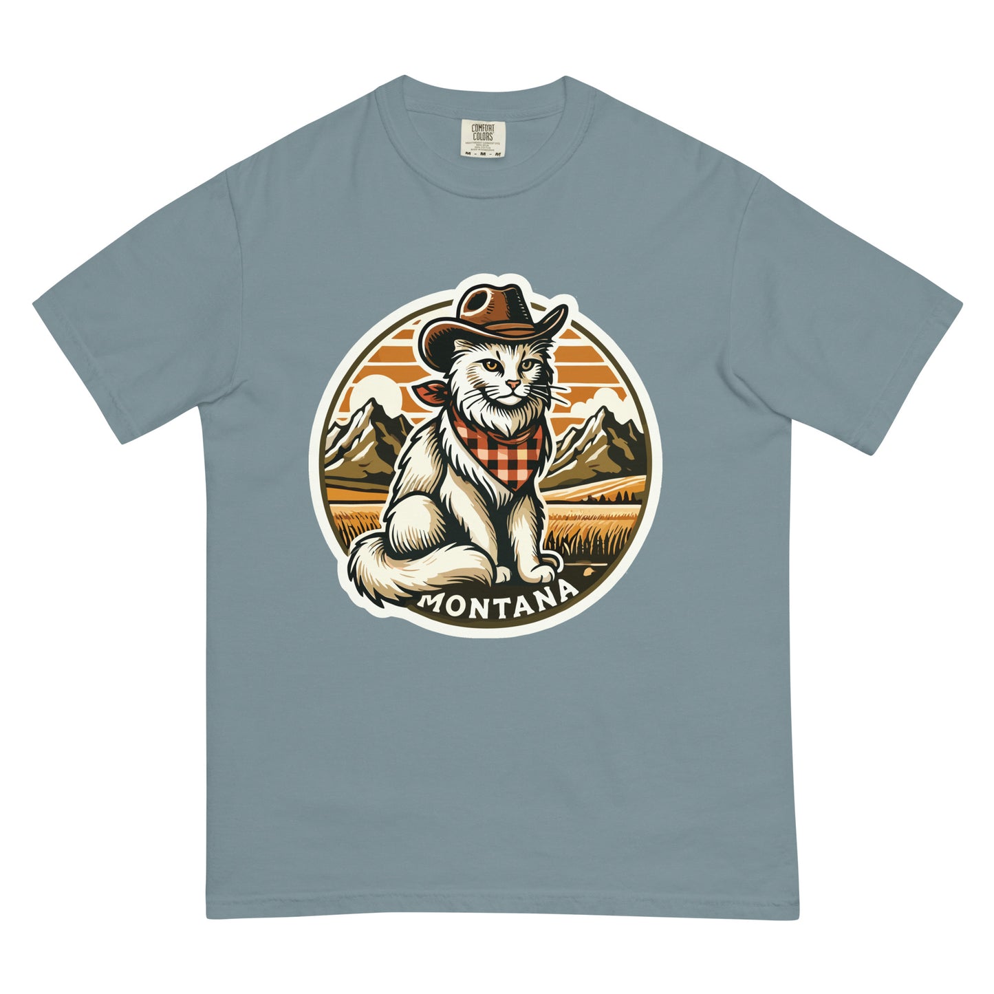 Meowrica Montana cat t-shirt with a white cat wearing a cowboy hat and bandana against mountain background