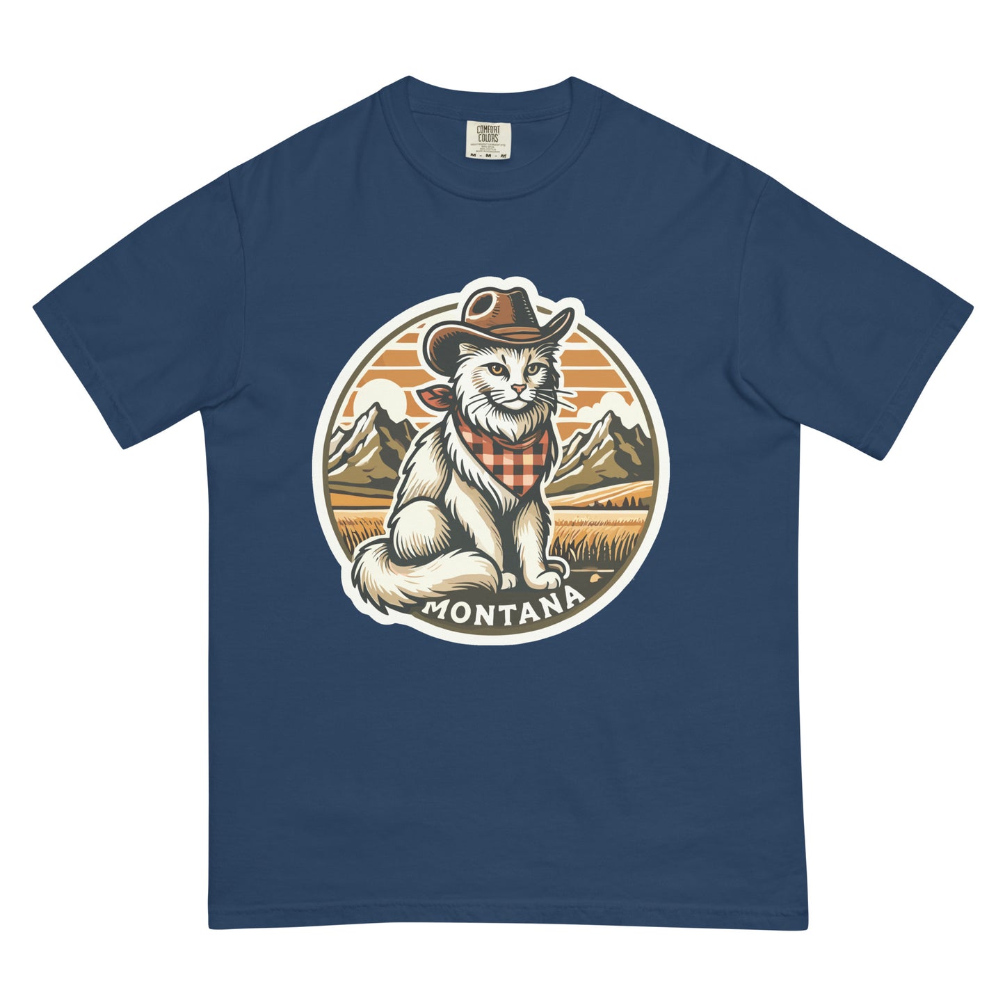 Blue Montana cat t-shirt featuring a cat wearing a cowboy hat and bandana with mountain background