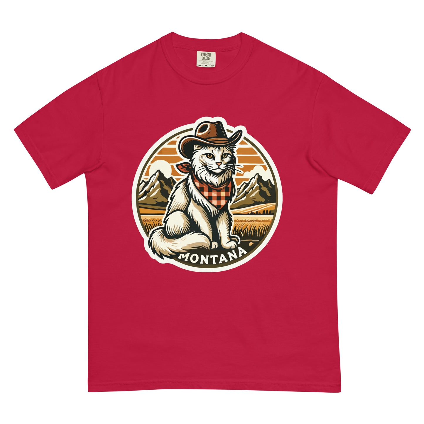 Red Montana cat t-shirt featuring a white cat wearing a cowboy hat and bandana with mountain background
