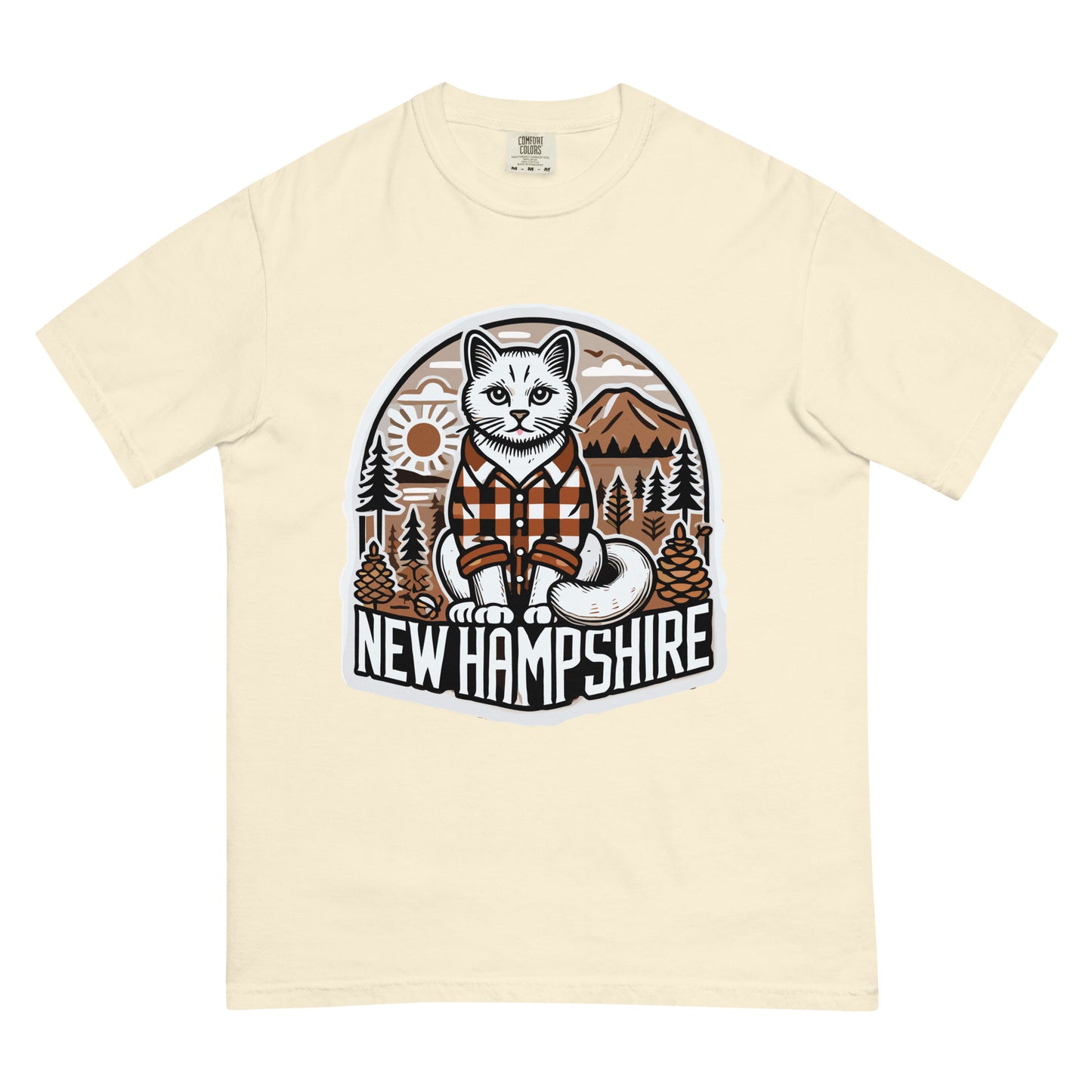 Beige New Hampshire cat t-shirt with a graphic of a cat in a plaid shirt in nature scene