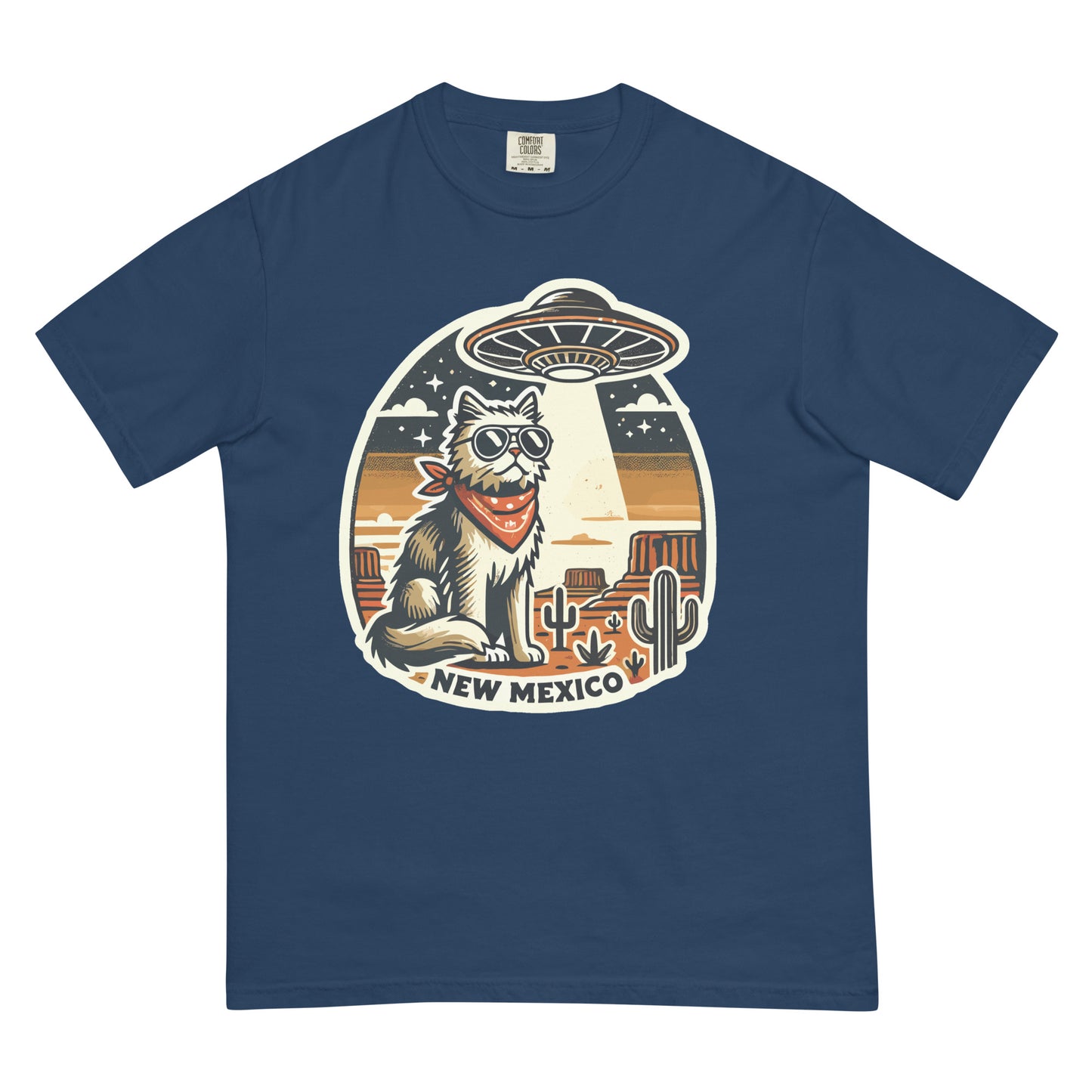 New Mexico cat t-shirt with a cool cat wearing sunglasses and a bandana under a UFO in desert scene