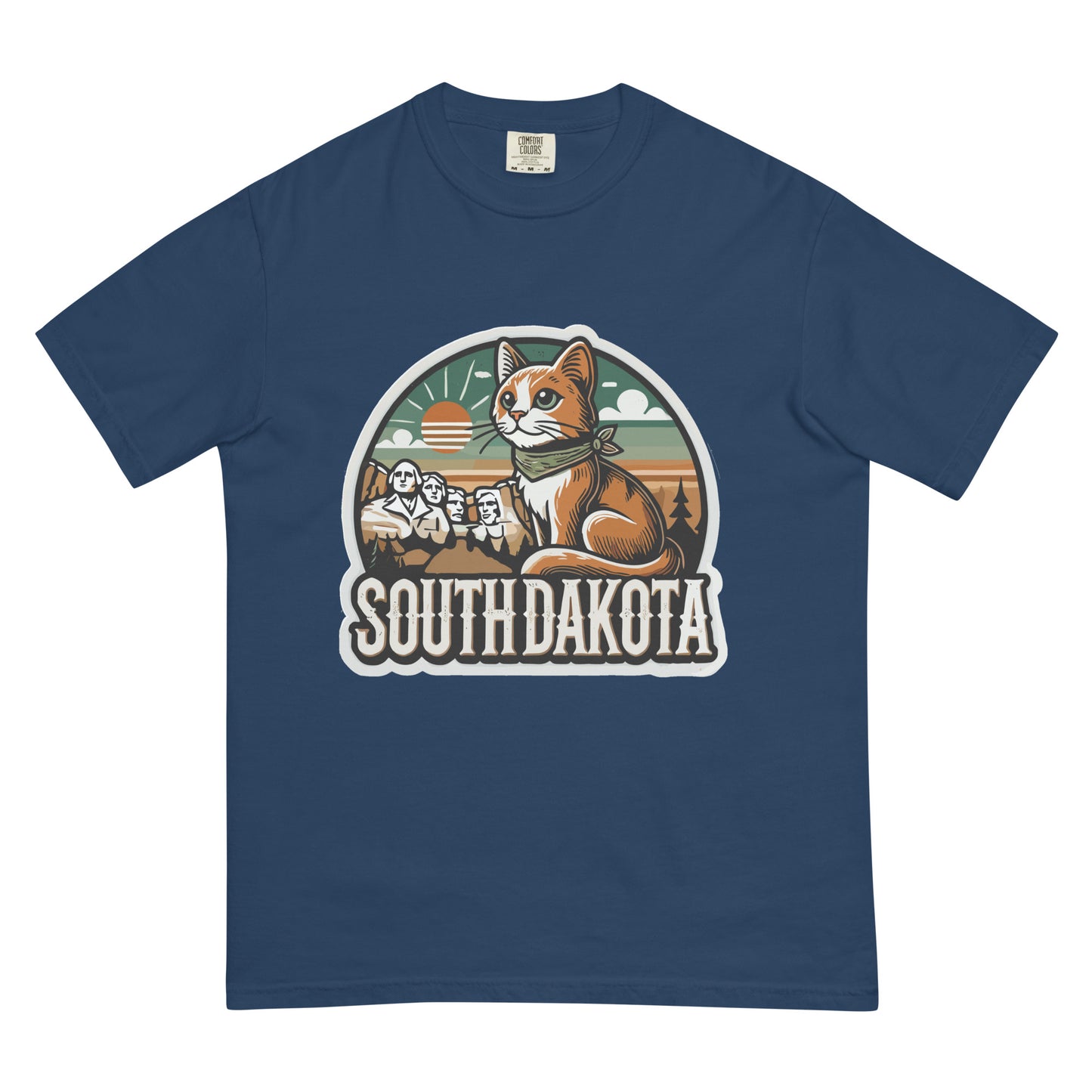 South Dakota cat t shirt in navy blue featuring a cat illustration with Mount Rushmore and sunset background