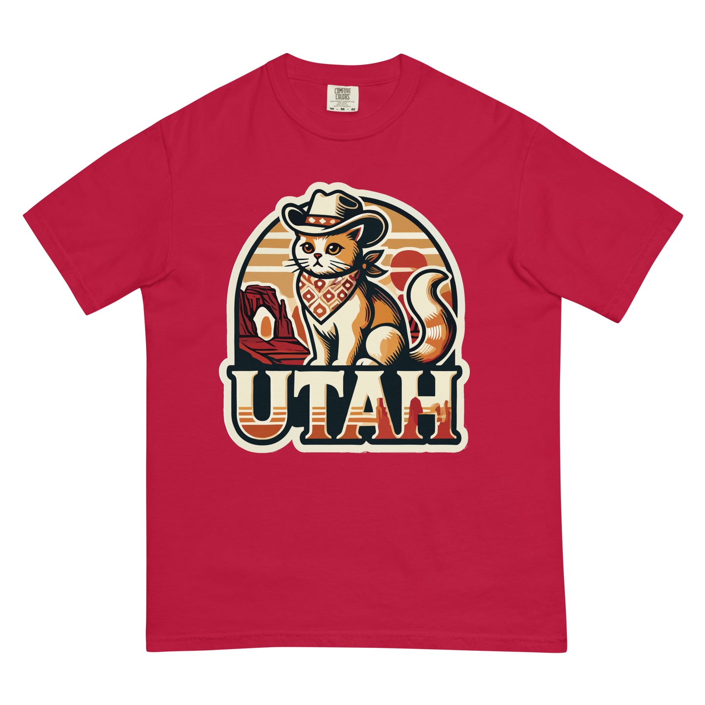 Red Utah cat t-shirt featuring a cat wearing a cowboy hat and bandana with Utah landscape background