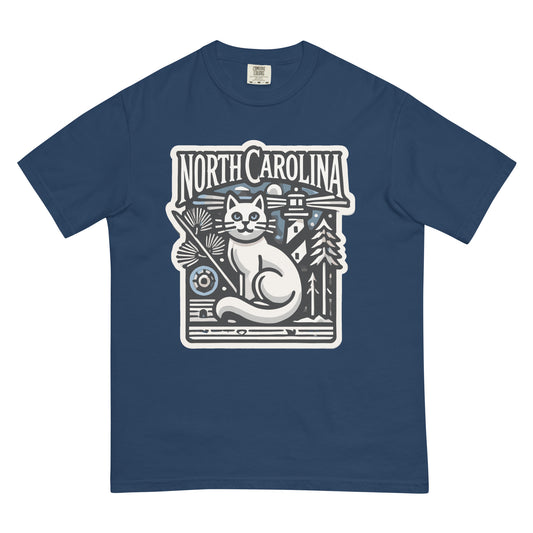 North Carolina cat shirt in navy blue featuring a white cat and lighthouse graphic design