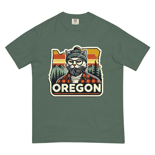 Green Oregon cat t-shirt featuring a hipster cat with glasses and beanie in front of Oregon sunset and trees