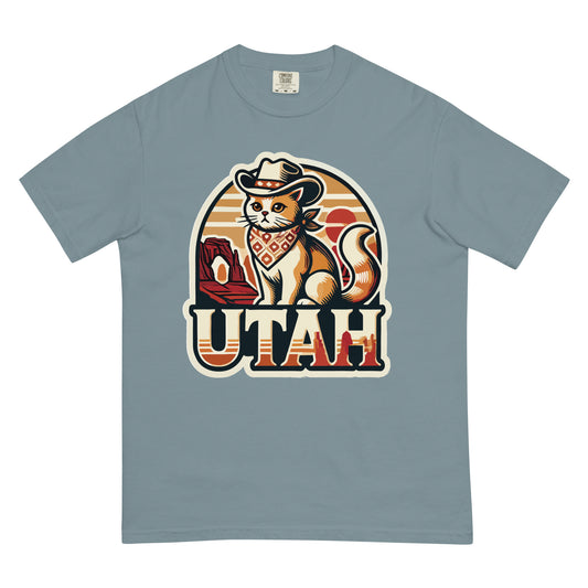 Blue Utah cat t-shirt featuring a cat in cowboy hat and bandana with Utah landscape design